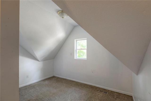 934 Williams St, Excelsior Springs, MO 64024 - bonus room featuring lofted ceiling and carpet flooring