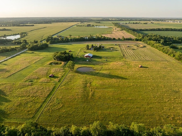 28909 E 297th St, Garden City, MO 64747 - aerial overview of property's location with rural landscape and extensive farmland