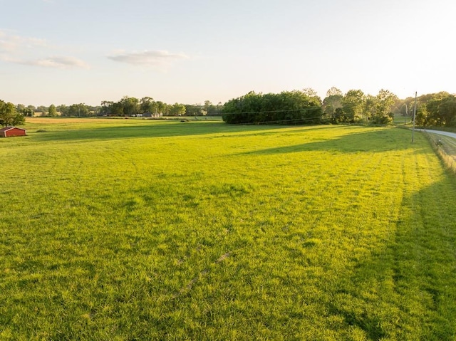 28909 E 297th St, Garden City, MO 64747 - view of property's community featuring a lawn and a rural view