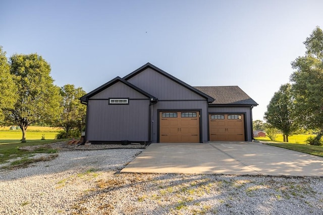 28909 E 297th St, Garden City, MO 64747 - garage with driveway
