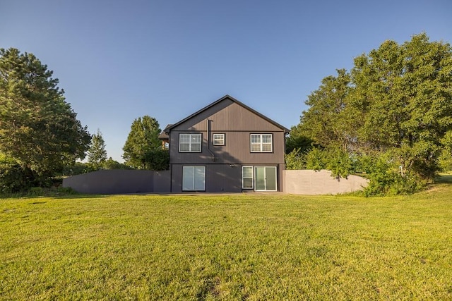 28909 E 297th St, Garden City, MO 64747 - back of house with a lawn