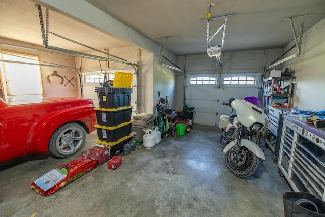 28909 E 297th St, Garden City, MO 64747 - garage featuring a garage door opener