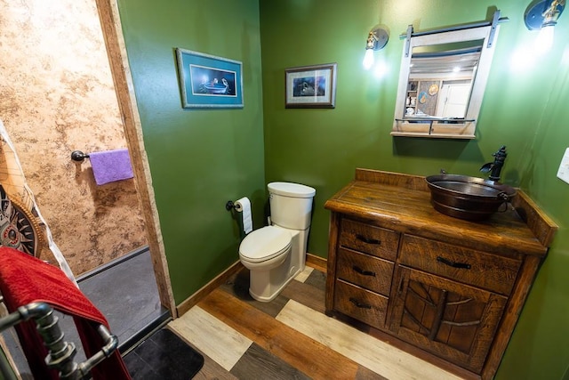 28909 E 297th St, Garden City, MO 64747 - bathroom featuring wood finished floors and vanity