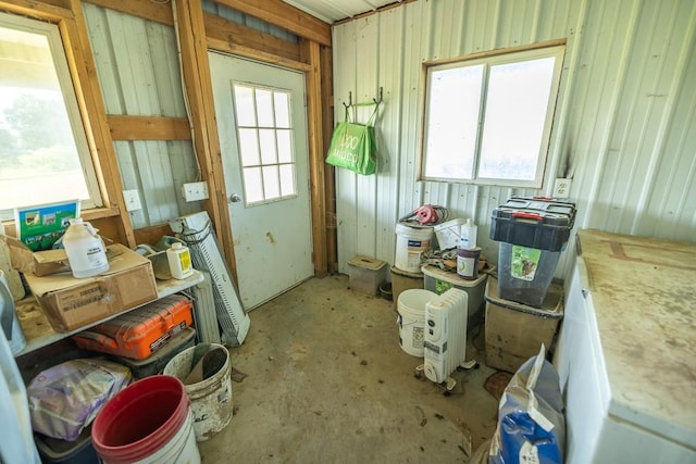 28909 E 297th St, Garden City, MO 64747 - doorway to outside featuring unfinished concrete flooring