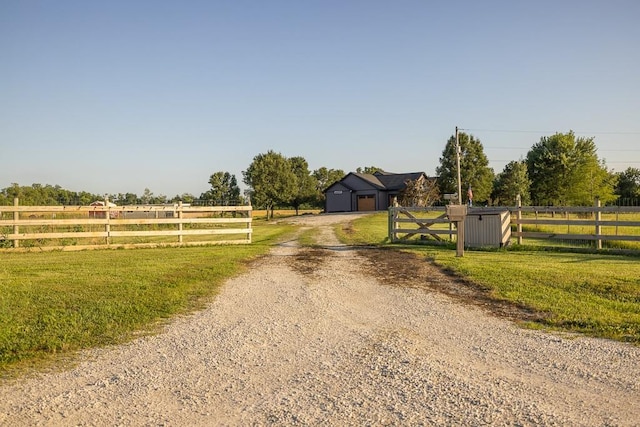 28909 E 297th St, Garden City, MO 64747 - view of road featuring a view of countryside and a gated entry