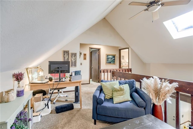 9514 W 77th Ter, Overland Park, KS 66204 - living area featuring carpet flooring, ceiling fan, vaulted ceiling, a skylight, and a desk