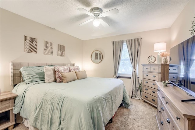 9514 W 77th Ter, Overland Park, KS 66204 - bedroom with light carpet, a textured ceiling, and a ceiling fan