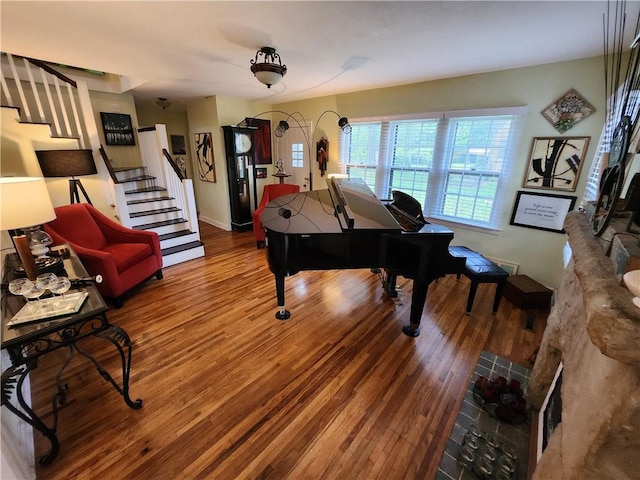 315 N 1st St, Independence, KS 67301 - living area featuring stairs and wood finished floors