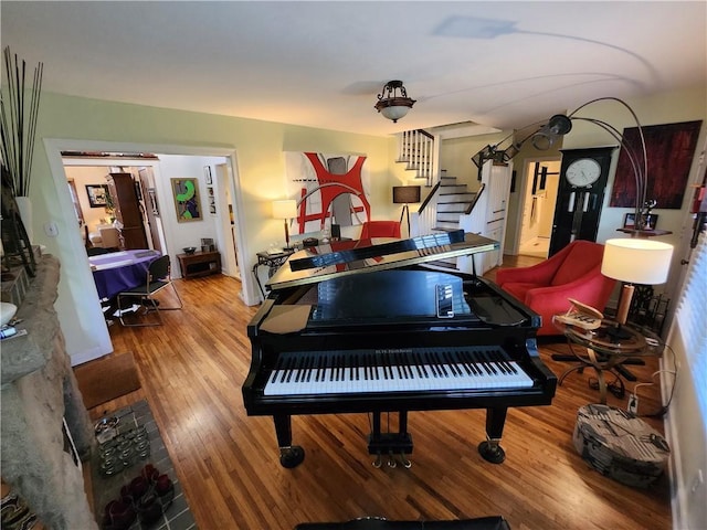 315 N 1st St, Independence, KS 67301 - sitting room with wood finished floors and stairs