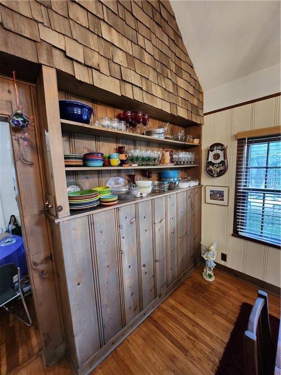 315 N 1st St, Independence, KS 67301 - bar area featuring vaulted ceiling and wood finished floors