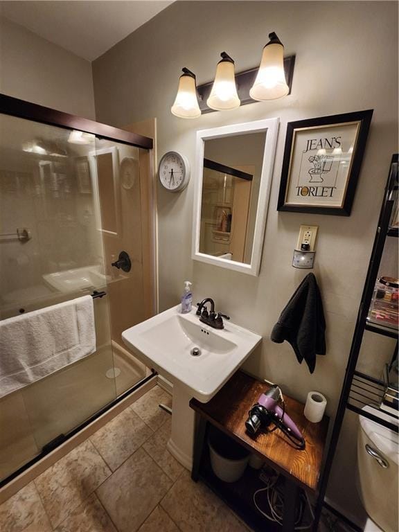 315 N 1st St, Independence, KS 67301 - bathroom with toilet and a stall shower