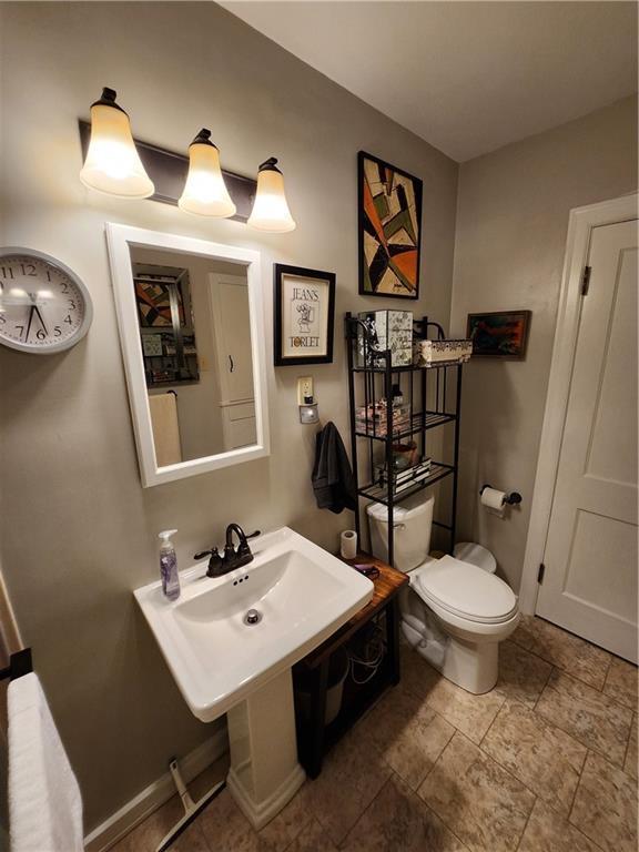 315 N 1st St, Independence, KS 67301 - bathroom featuring toilet