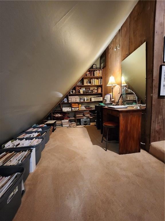 315 N 1st St, Independence, KS 67301 - office area featuring carpet, lofted ceiling, and wood walls