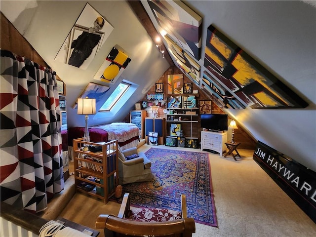 315 N 1st St, Independence, KS 67301 - bedroom featuring vaulted ceiling, carpet flooring, and a skylight