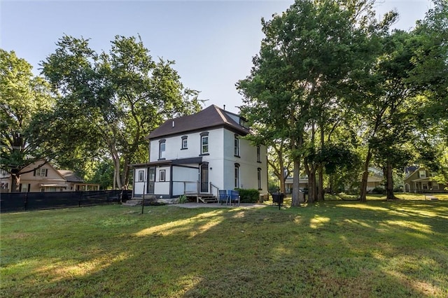 404 S Sycamore St, Ottawa, KS 66067 - back of house featuring entry steps