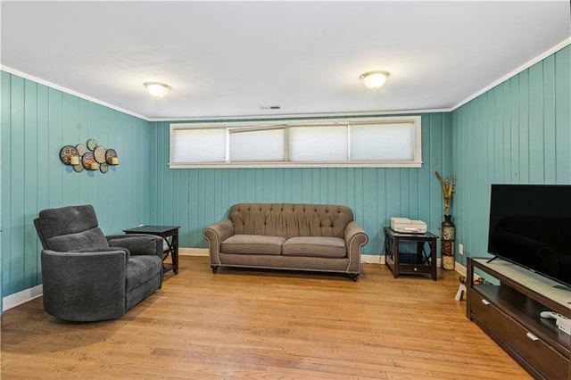 711 E 72nd Ter, Kansas City, MO 64131 - living area featuring crown molding and wood finished floors
