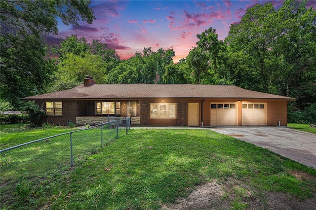 6327 Yecker Ave, Kansas City, KS 66104 - single story home featuring an attached garage, concrete driveway, a chimney, and brick siding