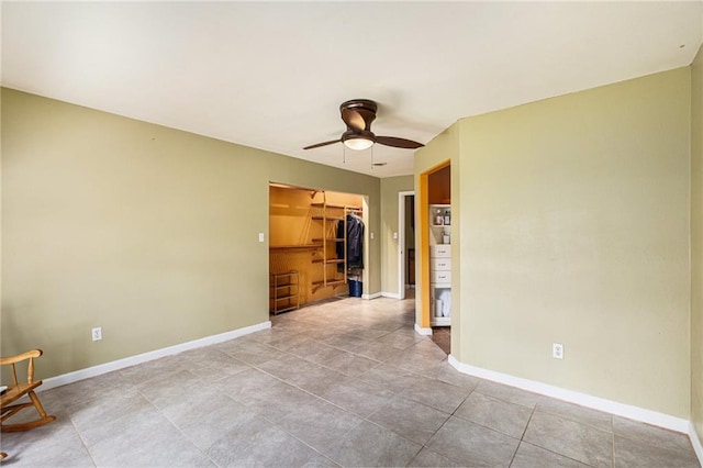 6327 Yecker Ave, Kansas City, KS 66104 - empty room featuring a ceiling fan and baseboards