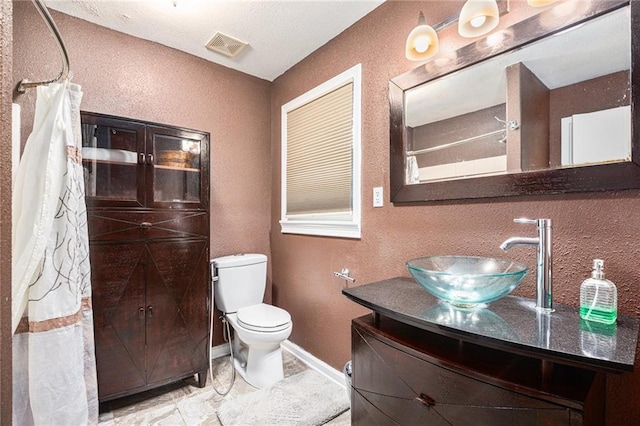 6327 Yecker Ave, Kansas City, KS 66104 - full bath with vanity, a shower with curtain, and a textured wall