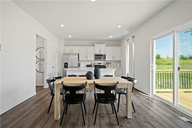 21807 Lucca Ln, Peculiar, MO 64078 - dining area with dark wood-style flooring and recessed lighting
