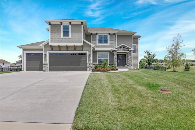 24704 W 76th St, Shawnee, KS 66227 - view of front of property with stone siding, driveway, and a garage