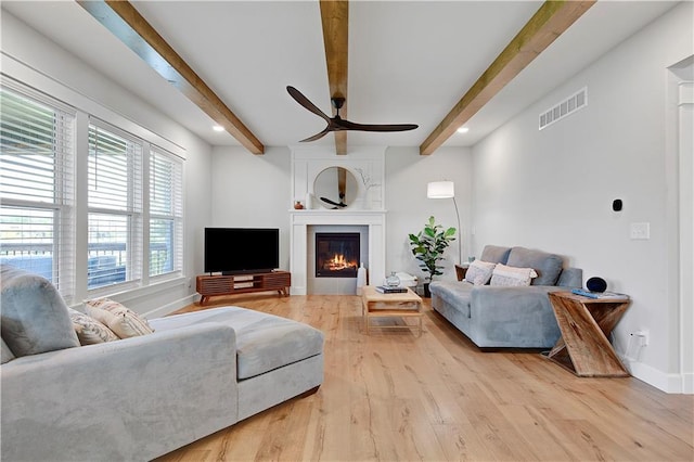 24704 W 76th St, Shawnee, KS 66227 - living area featuring ceiling fan, beam ceiling, wood finished floors, a large fireplace, and recessed lighting