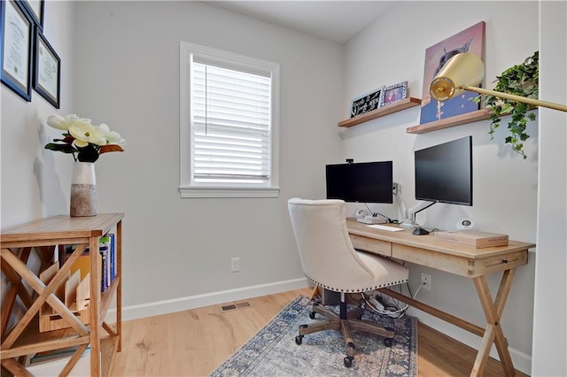 24704 W 76th St, Shawnee, KS 66227 - home office featuring wood finished floors