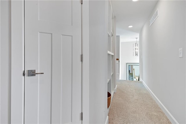 24704 W 76th St, Shawnee, KS 66227 - hallway with carpet floors, recessed lighting, and a chandelier