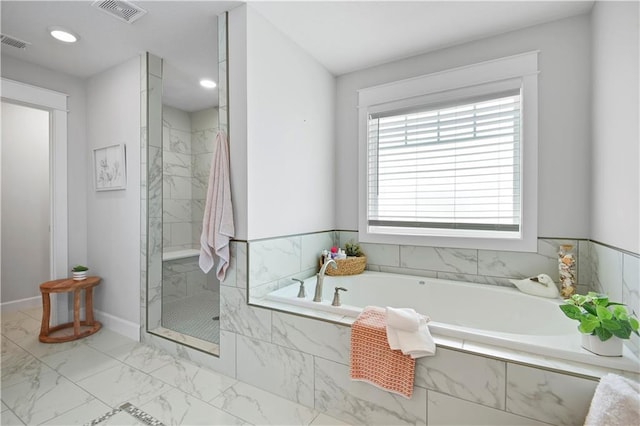 24704 W 76th St, Shawnee, KS 66227 - bathroom with marble finish flooring, a bath, a marble finish shower, and recessed lighting