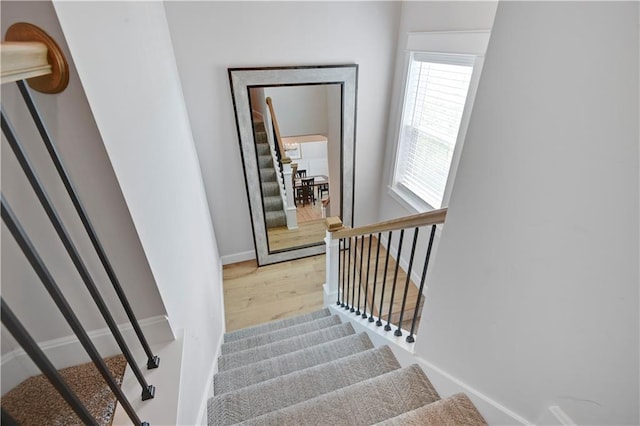 24704 W 76th St, Shawnee, KS 66227 - stairs with wood finished floors and baseboards