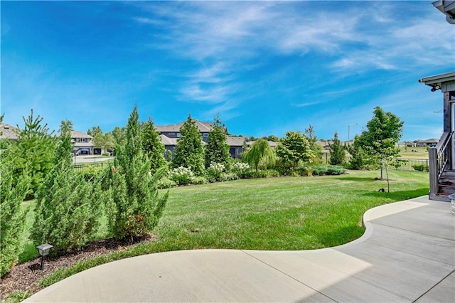 24704 W 76th St, Shawnee, KS 66227 - view of green lawn with a patio
