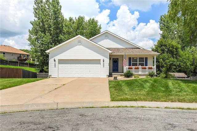 4204 Broadway Ter, Leavenworth, KS 66048 - ranch-style home with an attached garage, concrete driveway, and a porch