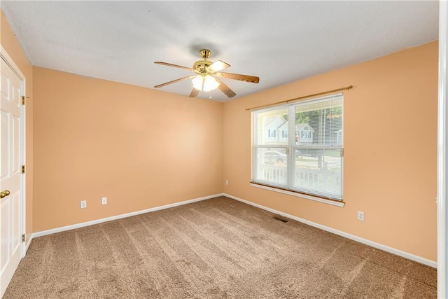 4204 Broadway Ter, Leavenworth, KS 66048 - empty room featuring carpet flooring and a ceiling fan