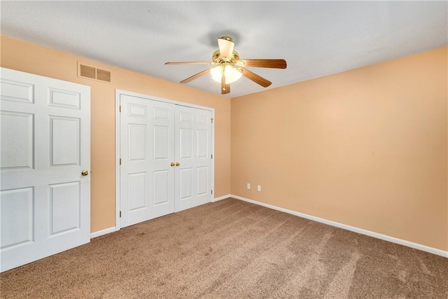 4204 Broadway Ter, Leavenworth, KS 66048 - unfurnished bedroom with carpet floors, a closet, and a ceiling fan