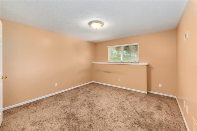 4204 Broadway Ter, Leavenworth, KS 66048 - spare room featuring carpet floors and a textured ceiling