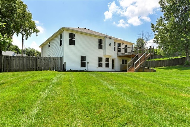 4204 Broadway Ter, Leavenworth, KS 66048 - back of house featuring stairs, a deck, and a fenced backyard