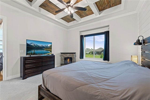 227 SW Eagles Ridge Dr, Blue Springs, MO 64014 - bedroom featuring coffered ceiling, crown molding, carpet floors, ceiling fan, and a wood ceiling with exposed beams