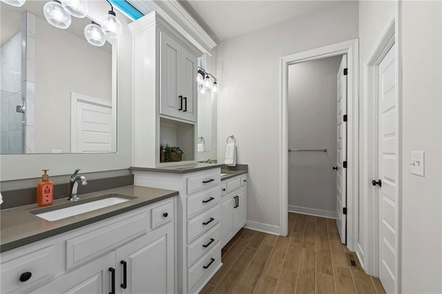 227 SW Eagles Ridge Dr, Blue Springs, MO 64014 - bathroom with vanity, wood finished floors, and a shower