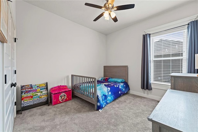227 SW Eagles Ridge Dr, Blue Springs, MO 64014 - carpeted bedroom featuring baseboards and ceiling fan