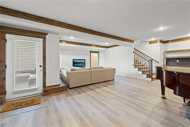 227 SW Eagles Ridge Dr, Blue Springs, MO 64014 - living area with beam ceiling, stairs, wood finished floors, and recessed lighting