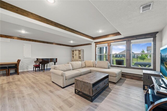 227 SW Eagles Ridge Dr, Blue Springs, MO 64014 - living area featuring light wood finished floors, recessed lighting, and beam ceiling