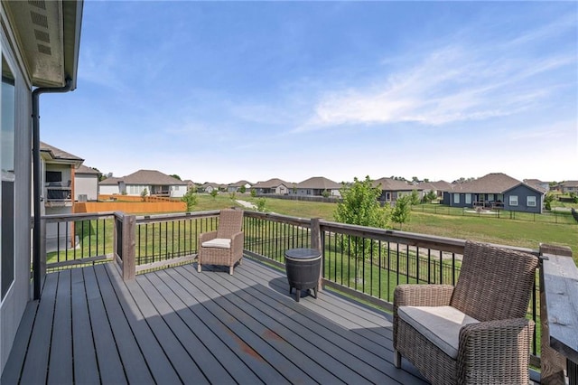 227 SW Eagles Ridge Dr, Blue Springs, MO 64014 - wooden deck with a residential view and a yard