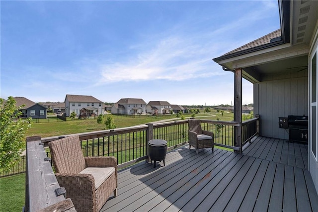 227 SW Eagles Ridge Dr, Blue Springs, MO 64014 - wooden deck featuring a residential view, a lawn, and a grill