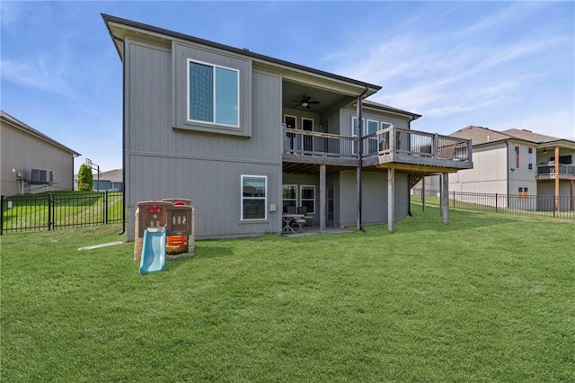 227 SW Eagles Ridge Dr, Blue Springs, MO 64014 - back of property with a fenced backyard, a ceiling fan, and a wooden deck