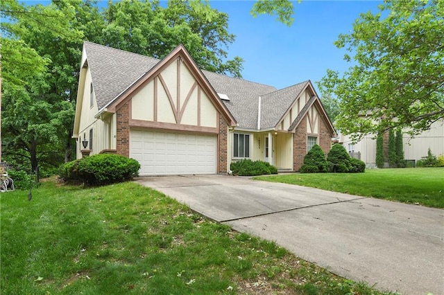 10432 Bond St, Overland Park, KS 66214 - tudor house with an attached garage, roof with shingles, concrete driveway, a front lawn, and brick siding