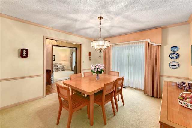 10432 Bond St, Overland Park, KS 66214 - dining area featuring a chandelier, light colored carpet, crown molding, and a textured ceiling