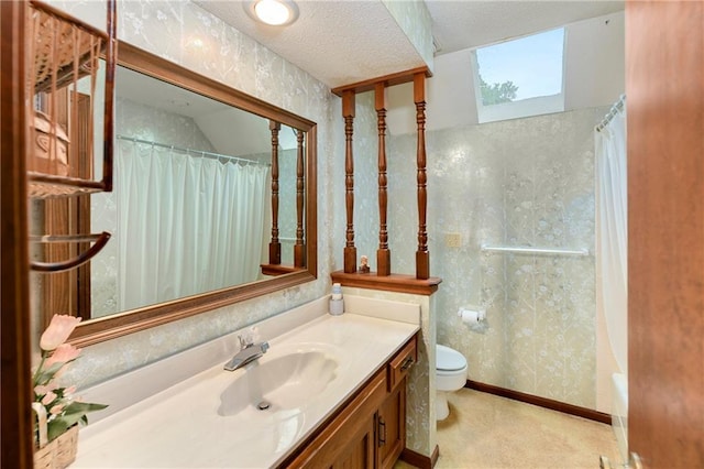 10432 Bond St, Overland Park, KS 66214 - bathroom with vanity and a textured ceiling