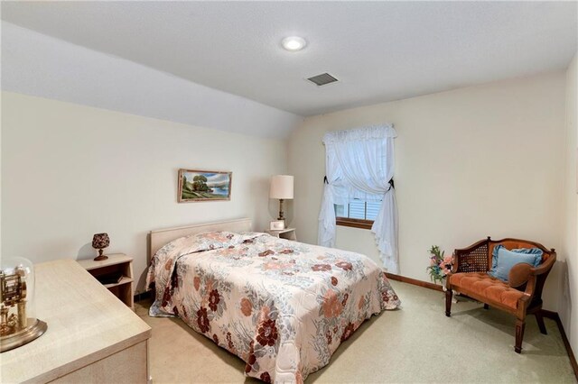 10432 Bond St, Overland Park, KS 66214 - bedroom featuring light carpet, vaulted ceiling, and recessed lighting