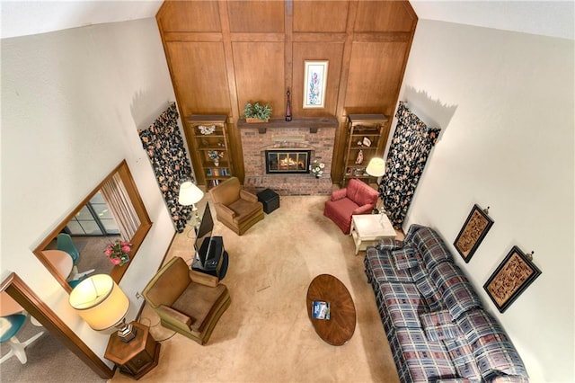 10432 Bond St, Overland Park, KS 66214 - carpeted living area featuring a fireplace