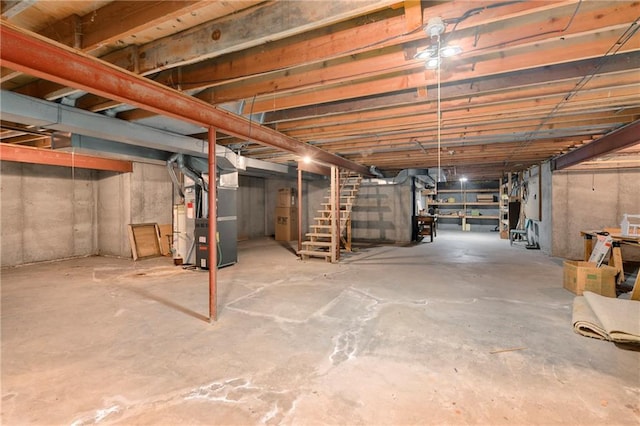 10432 Bond St, Overland Park, KS 66214 - unfinished basement featuring stairs and heating unit